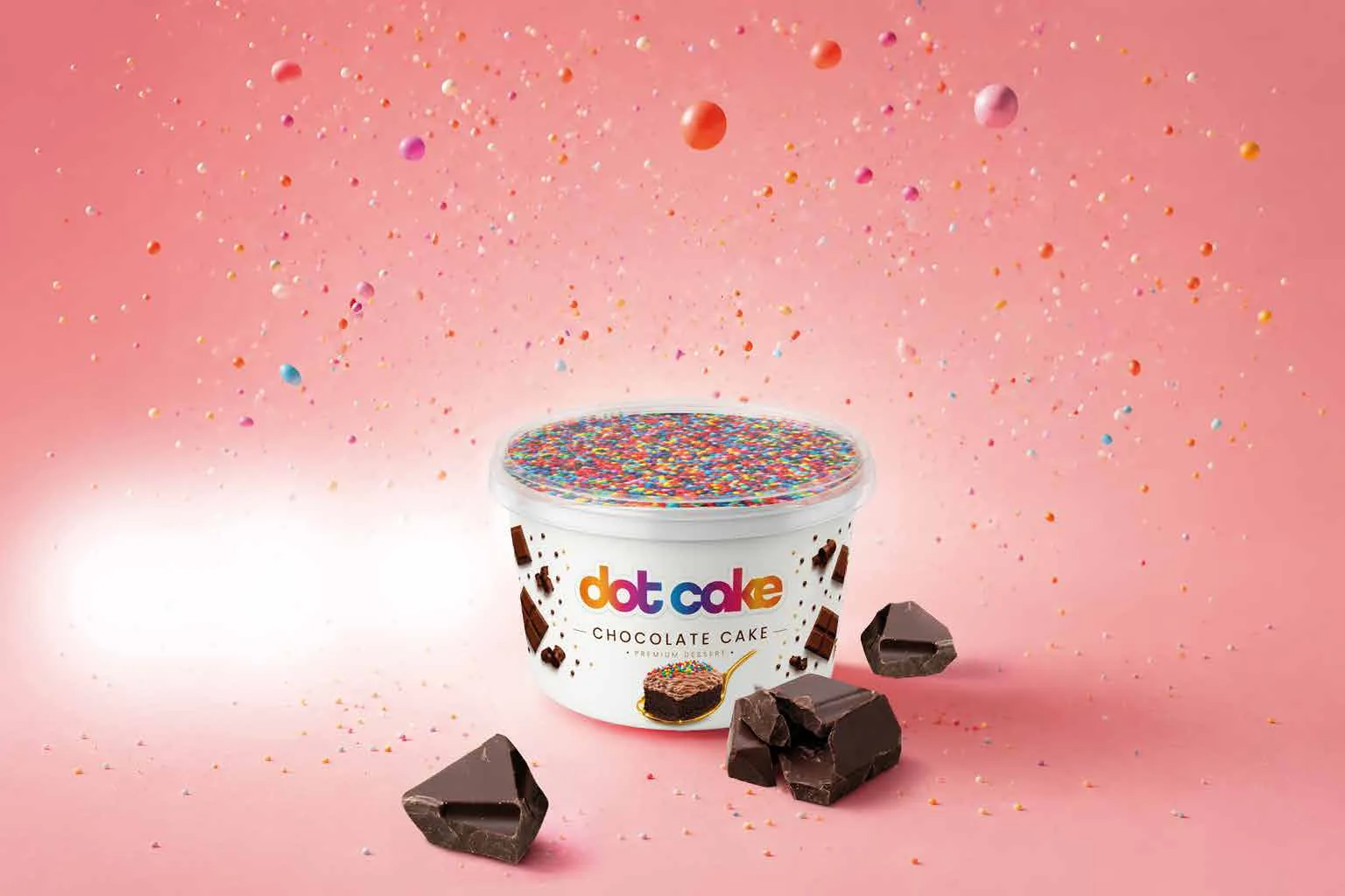 Dot Cake Chocolate – white cup with colourful sugar sprinkles and chocolate pieces