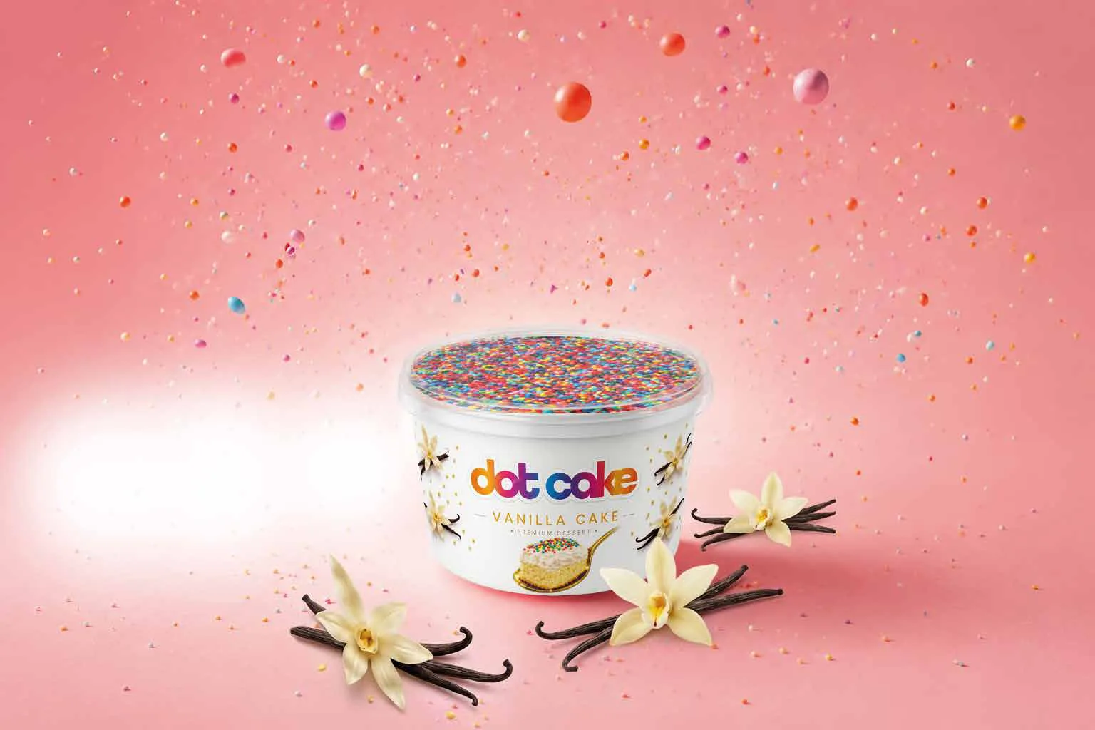 Dot Cake Vanilla – white cup with colourful sugar sprinkles and vanilla flowers